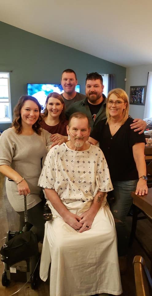 Family group smiling together